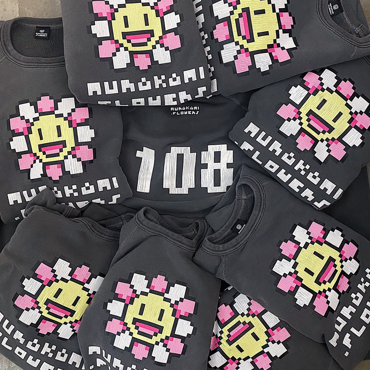 【©Takashi Murakami / kaikai kiki】<br /> New colors for "Murakami.Flowers" sweatshirts and hoodies! Online sales start from 20:00 today, 4/6 (Thursday)!