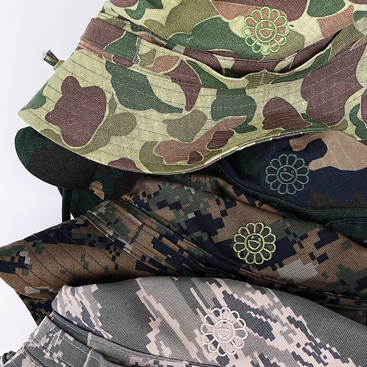 【©Takashi Murakami / kaikai kiki】 Camouflage Bucket Hat will be on sale online from 20:00 today, August 29th (Tuesday)!
