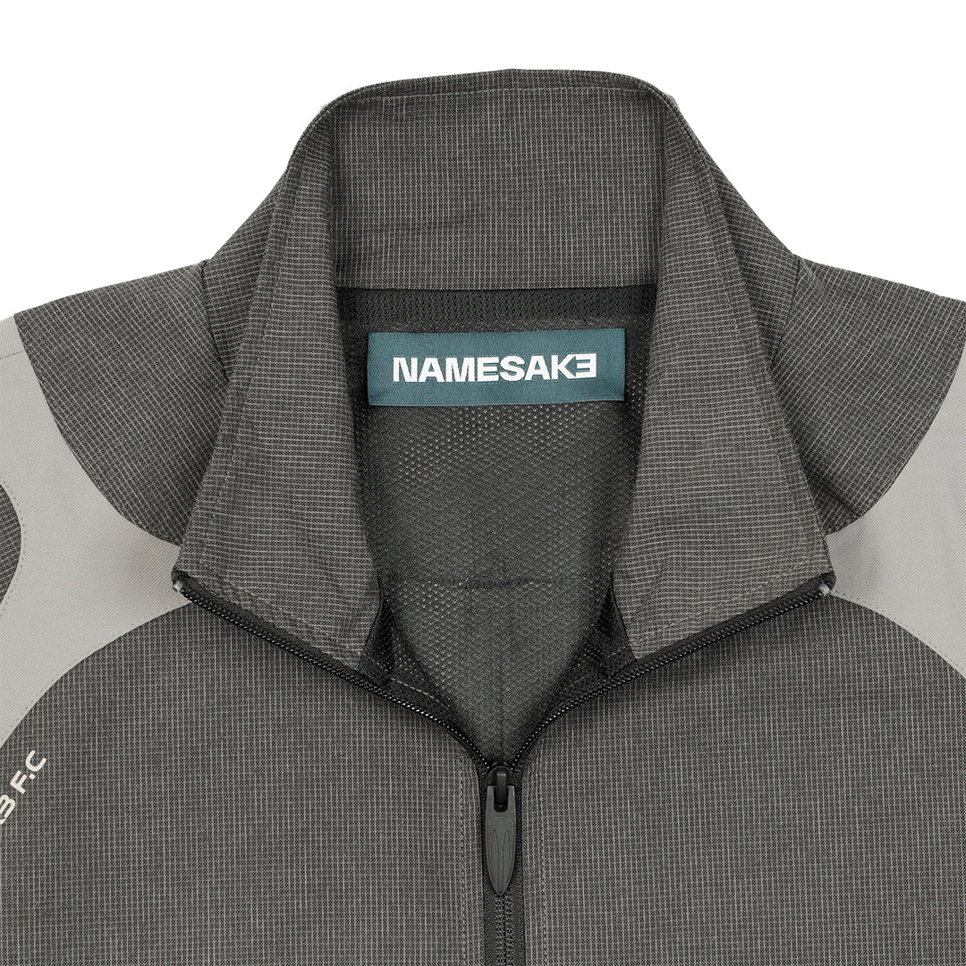 NAMESAKE（ネイムセイク）- NEWMAN HALF ZIP トラックジャケット